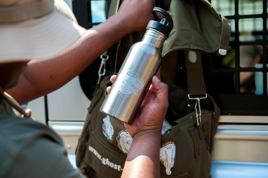 individually designed stainless steel bottle and bagpack with white toner