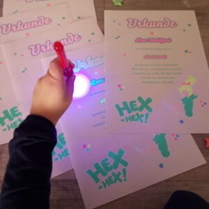 colorful papersheet with glow-in-the-dark effect printed with ghost neon toner